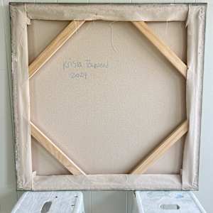 Microcosm by Krista Townsend  Image: The painting from the back where the stretchers are showing with corner braces. 