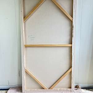 Spider Island Reflections by Krista Townsend  Image: The back of the stretcher with corner braces and a center horizontal brace.