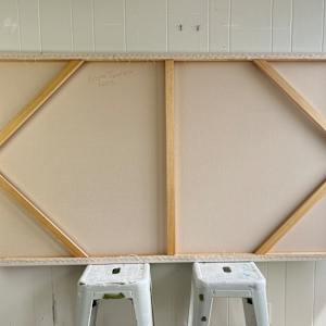 Waiting for Dark by Krista Townsend  Image: The back of the stretcher with corner braces and a center vertical brace.