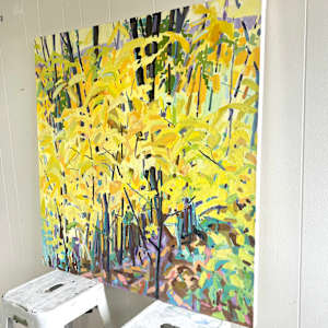 Yellow Leaves by Krista Townsend  Image: The painting sitting on top of two stools in the studio from an angle.