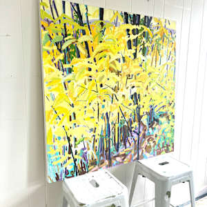 Yellow Leaves by Krista Townsend  Image: The painting sitting on top of two stools in the studio from an angle.