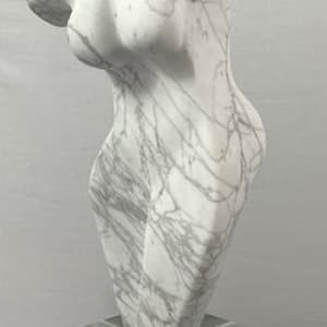 Dancing Muse by Scott Gentry Sculpture  Image: DANCING MUSE by Scott Gentry Sculpture. Carved from Calacatta marble and measuring 18.5Hx9Wx6D inches and placed atop a crystal base.