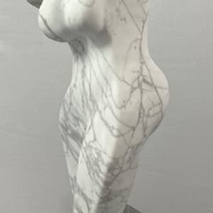 Dancing Muse by Scott Gentry Sculpture  Image: DANCING MUSE by Scott Gentry Sculpture. Carved from Calacatta marble and measuring 18.5Hx9Wx6D inches and placed atop a crystal base.