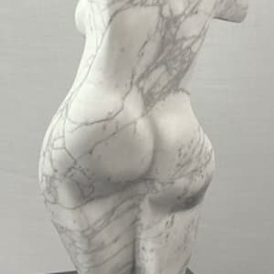 Dancing Muse by Scott Gentry Sculpture  Image: DANCING MUSE by Scott Gentry Sculpture. Carved from Calacatta marble and measuring 18.5Hx9Wx6D inches and placed atop a crystal base.