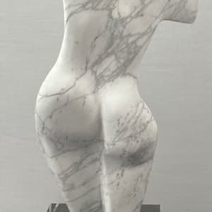 Dancing Muse by Scott Gentry Sculpture  Image: DANCING MUSE by Scott Gentry Sculpture. Carved from Calacatta marble and measuring 18.5Hx9Wx6D inches and placed atop a crystal base.