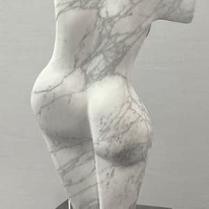 Dancing Muse by Scott Gentry Sculpture  Image: DANCING MUSE by Scott Gentry Sculpture. Carved from Calacatta marble and measuring 18.5Hx9Wx6D inches and placed atop a crystal base.