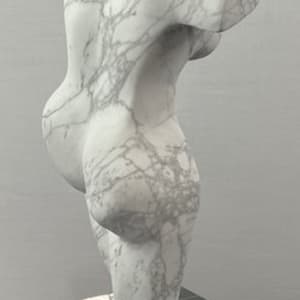Dancing Muse by Scott Gentry Sculpture  Image: DANCING MUSE by Scott Gentry Sculpture. Carved from Calacatta marble and measuring 18.5Hx9Wx6D inches and placed atop a crystal base.