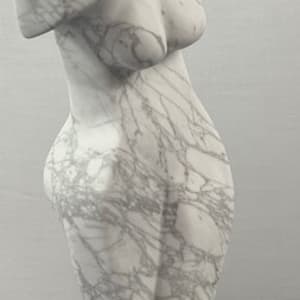 Dancing Muse by Scott Gentry Sculpture  Image: DANCING MUSE by Scott Gentry Sculpture. Carved from Calacatta marble and measuring 18.5Hx9Wx6D inches and placed atop a crystal base.
