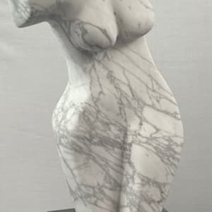 Dancing Muse by Scott Gentry Sculpture  Image: DANCING MUSE by Scott Gentry Sculpture. Carved from Calacatta marble and measuring 18.5Hx9Wx6D inches and placed atop a crystal base.