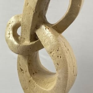 Lover's Knot by Scott Gentry Sculpture  Image: "Lover's Knot" by Scott Gentry Sculpture. Carved from Roman travertine and measuring 26Hx13Wx8D inches.
