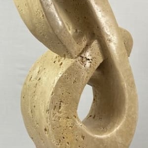 Lover's Knot by Scott Gentry Sculpture  Image: "Lover's Knot" by Scott Gentry Sculpture. Carved from Roman travertine and measuring 26Hx13Wx8D inches.