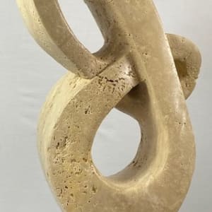 Lover's Knot by Scott Gentry Sculpture  Image: "Lover's Knot" by Scott Gentry Sculpture. Carved from Roman travertine and measuring 26Hx13Wx8D inches.