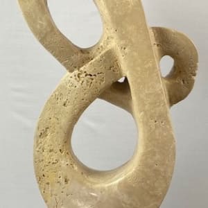 Lover's Knot by Scott Gentry Sculpture  Image: "Lover's Knot" by Scott Gentry Sculpture. Carved from Roman travertine and measuring 26Hx13Wx8D inches.
