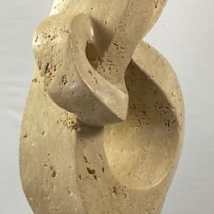 Lover's Knot by Scott Gentry Sculpture  Image: "Lover's Knot" by Scott Gentry Sculpture. Carved from Roman travertine and measuring 26Hx13Wx8D inches.