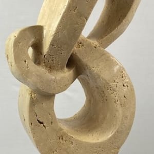Lover's Knot by Scott Gentry Sculpture  Image: "Lover's Knot" by Scott Gentry Sculpture. Carved from Roman travertine and measuring 26Hx13Wx8D inches.