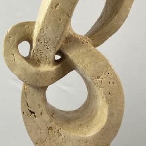 Lover's Knot by Scott Gentry Sculpture  Image: "Lover's Knot" by Scott Gentry Sculpture. Carved from Roman travertine and measuring 26Hx13Wx8D inches.