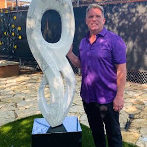 Muse of Light by Scott Gentry Sculpture  Image: Scott with "Muse of Light" at Fall Gallery Night in Fort Worth, Texas 2024.