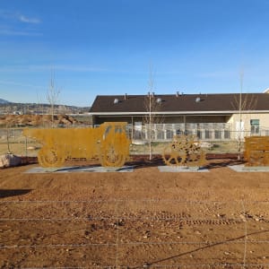 Cut Metal Sculptures by Moroni Arciniega  Image: Intersection of Kittyhawk, Bulldog, and Cold Creek Roads near 1303 Kittyhawk Drive.

Photograph by Steven D. Decker. Licensed by Creative Commons (CC BY-SA). 