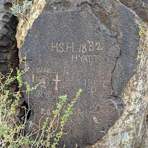 Parowan Gap  Image: Photograph by Jacob B. Arnell. Licensed by Creative Commons (CC BY-SA).

Surprisingly, these modern markings are not classified as vandalism. They were made by pioneer expedition members, and are seen as a part of the site's heritage. 