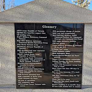 Cedar City War Memorial - Vietnam War by James Muir  Image: Photograph by Jacob B. Arnell. Licensed by Creative Commons (CC BY-SA).
Glossary

ARVN - Army Republic of Vietnam
FB/FSB - Fire base/fire support base
LZ - Landing zone
MACV - Military Assistance Command Vietnam
MAC-SOG - Military Assistance Command Special Operations Group
NVA - North Vietnam Army
RVN/South Vietnam - Republic of Vietnam
DMZ - Demilitarized zone separated North and South
USARV - United States Army Republic of Vietnam
VC - Viet Cong - South Vietnamese sympathetic with government of North Vietnam (Charlie)
MIA/KIA/WIA - Missing/killed/wounded in action
POW - Prisoner of war
CONUS - Continental United States
DEROS - Date eligible for return from overseas
FOB - Forward operating base
ROK's - Republic of Korea army
VNAF - Vietnam Air Force
AO - Area of operations
TDY - Temporary duty
AFVN - Armed Forces Vietnam radio station
PCS - Permanent change of station
R&R - Rest and recuperation
MAC/TAC/SAC - Military Airlift Command/Tactical Air Command/Strategic Air Command (Air Force)
NDP - Night defensive position
P38 - Can opener
Corps - Military divisions of Vietnam (I, II, III, IV)
I Corps - "Eye" corps
Grunt - Infantry soldier
Slick - Helicopter, Huey
Spooky/Specter/Shadow - Air Force gunship
Sapper - NVA demolition commandos
Rolling Thunder - Air Force bombing operation, 1965-68
Number 1/10 - Vietnamese rating from best to worst
Short Timer - Less than 100 days in country
Boo-coo - From beaucoup (F), much or many
Didi Mau - Vietnamese slang for "go quickly"
Dinky Dau - To be crazy
Mama/Papa San - Adult female/male Vietnamese
Hooch - A building of no specific shape
33 beer - 3.3% alcohol beer in country
