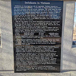 Cedar City War Memorial - Vietnam War by James Muir  Image: Photograph by Jacob B. Arnell. Licensed by Creative Commons (CC BY-SA).
Defoliants in Vietnam

Defoliants are chemicals that kill all vegetation. Earliest research on defoliants began during WWII. A University of Chicago botanist discovered that plant hormones could kill certain vegetation. The Army tested the plant hormones but found no use for them before the end of the war. Britain was the first to use a defoliant during military operations in Malaya in 1953 to thin jungle trails to limit ambushes. The decision to use defoliants in Vietnam was for the same purpose. The chemicals killed triple canopy jungle that hid the enemy, the elephant grass along river banks that allowed the enemy to get too close to the soldiers and sailors, and around bases to keep an open view for sentries.

With the full support of the South Vietnamese government, spraying began in January 1962 by the Air Force and continued for nine years. The Air Force name for the project was Operation Ranch Hand. Over the nine years, 19,395,963 gallons of defoliant was sprayed in Vietnam.

Operation Ranch Hand sprayed 8.2 million gallons of defoliant with the remainder being sprayed by Army helicopters, trucks, or back packs around military bases. Operation Ranch Hand spraying occurred all over South Vietnam, but the heaviest spraying was in III Corps.

I Corps: 2,355,322 gallons
II Corps: 1,065,406 gallons
III Corps: 4,068,229 gallons
IV Corps: 669,534 gallons
Operation Ranch Hand spraying stopped in January 1971, but the Vietnamese Air Force (VNAF) continued to spray after that.

Fifteen different defoliants were sprayed in Vietnam. Several were named after the colored stripe on the barrel – agents green, pink, purple, blue, white, and orange. They were known as the Rainbow Herbicides. More than 11 million gallons of Agent Orange, the most notorious of the Rainbow Herbicides, were sprayed.

Several of the defoliants sprayed in Vietnam contained the chemicals 2,4-D and 2,4,5-T. A manufacturing contaminant in 2,4,5-T is 2,3,7,8-T (dioxin), which is highly toxic to humans and animals. In 1983, 2,4,5-T was withdrawn from the market because of the dioxin contaminant and heightened public sensitivity about chemical hazards in the environment.

The dioxin in the defoliants has been linked to many health issues in Vietnam veterans and their children. Any military personnel that had permanent duty status in Vietnam between August 5, 1964 and May 7, 1975 is presumed by law to have been exposed to dioxin and can receive compensation for their illnesses if linked to dioxin exposure. At present, eleven illnesses in Vietnam veterans and two illnesses in the children of women Vietnam veterans have been scientifically linked to the veteran's exposure to dioxin. Research continues by the VA through the National Academy of Sciences’ Institute of Medicine to identify additional diseases that may be linked to dioxin exposure.

The website for further information is www.va.gov/agentorange.

President Ford renounced the use of defoliants in war except around base perimeters on April 8, 1975. The last Agent Orange was destroyed on September 3, 1977.