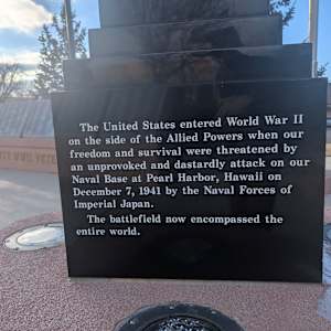 Cedar City War Memorial - World War II by Robert D. Mercer  Image: Photograph by Jacob B. Arnell. Licensed by Creative Commons (CC BY-SA).
The United States entered World War II on the side of the Allied Powers when our freedom and survival were threatened by an unprovoked and dastardly attack on our Naval Base at Pearl Harbor, Hawaii on December 7, 1941 by the Naval Forces of Imperial Japan.

The battlefield now encompassed the entire world.
