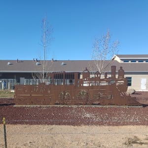 Cut Metal Sculptures by Moroni Arciniega  Image: Intersection of Kittyhawk, Bulldog, and Cold Creek Roads near 1303 Kittyhawk Drive.

Photograph by Steven D. Decker. Licensed by Creative Commons (CC BY-SA). 