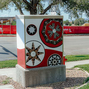Utility Box Wrap (SUU Mandala) by Mallory Sanders  Image: 300 W and University Boulevard (Center Street) Cedar City, UT.

Photograph by Ryann S. Ford. Licensed by Creative Commons (CC  BY-SA). 