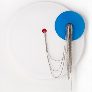Moderne  9 pc Installation by Beth Kamhi  Image: Moderne white circle. white acrylic plexiglass and steel beads
24 x 24 x 2 in