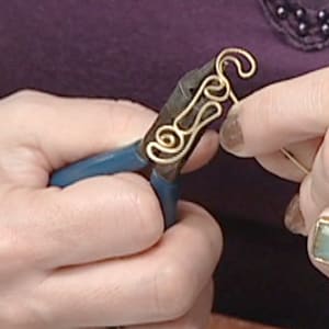 Lumiere by Victoria Lansford  Image: Bending the shank's filigree frame