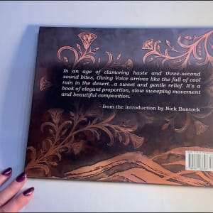 Giving Voice - Print and Animated eBook with Mokume Gane, Eastern Repoussé and Etched Covers by Victoria Lansford  Image: Back cover of hardbound book