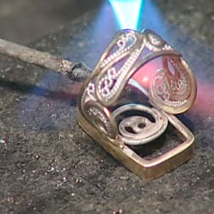 Lumiere by Victoria Lansford  Image: Soldering the shank to the bezel
