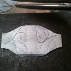 Enveloped II by Victoria Lansford  Image: Sterling sheet with chased lines at the beginning of the Eastern repoussé process