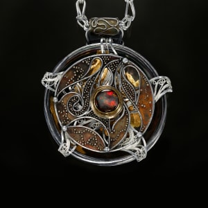 Relativity Navigator by Victoria Lansford  Image: Granulation, Russian filigree, and gilt spinning pendant 
