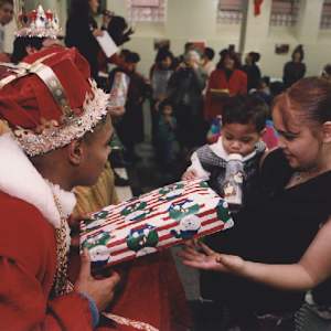 Distributing Gifts by Charles Agel