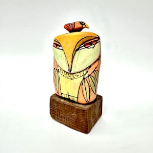 "Owl Person and the Nesting Red Bird Dreaming Love" by Blue Fire MacMahon  Image: Owl art handmade from clay, colorful owl figurine, "Owl Person and the Nesting Red Bird Dreaming Love", Height 5 inches