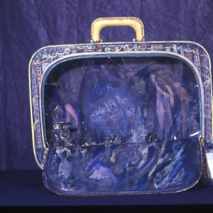 HANDLE WITH CARE-SELF-PORTRAIT,  Suitcase by Beatriz Mejia-Krumbein 