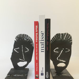 Bookend Faces by John A. Mantooth