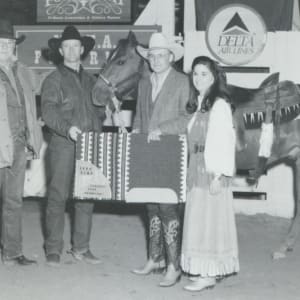 Winston Hansma  Image: Winston Hansma receiving his award for winning the 1994 NCHA Futurity Open class, riding CD Olena.