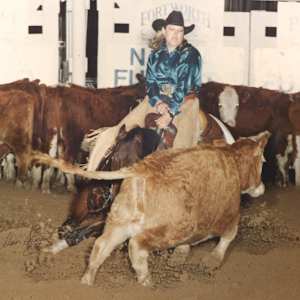 Debbie Patterson  Image: Debbie Patterson riding Sandy Jo Lena at the NCHA Futurity