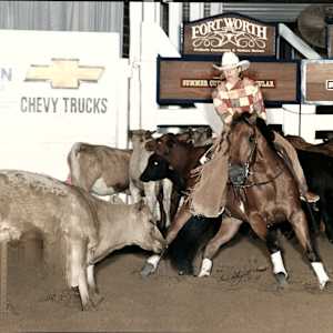 John & Kelle Carter  Image: Kelle Carter showing at the NCHA Summer Spectacular. 