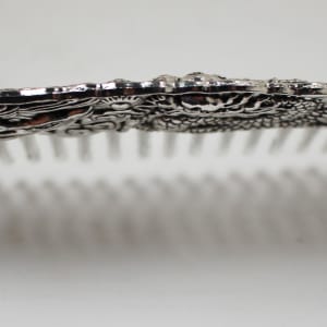 Dragon and pearl metal comb 
