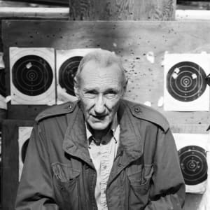 William S. Burroughs holding his  Little "Sweetheart Deringer" by Nelson  Lyon