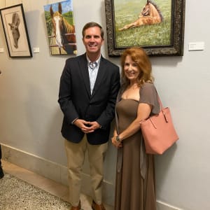 First Foal by Salina Ramsay  Image: Kentucky Governor, Andy Beshear and Salina Ramsay in front of First Foal.