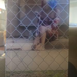 Untitled- Candid from Afar by Niko Cherry