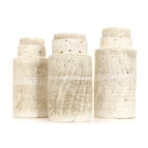white canisters by Ani Kasten