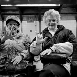 “I Love You” sign language in the subway, New York City by Donna Ferrato