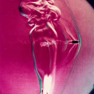 Bullet through Candle Flame by Harold Edgerton