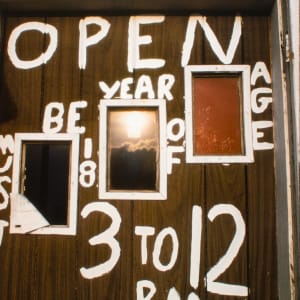 Painted door sign, Indianola, Mississippi, 1974 by William R. Ferris