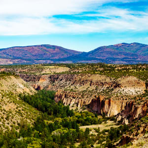 Frijoles Canyon and Jemez Mountains, Morning by Rodney Buxton